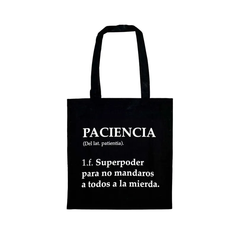 Tote bag negra sobre fondo blanco con definición tipo diccionario de la palabra "Paciencia" impresa en blanco - Happyideas