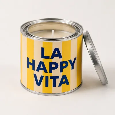 Vela aromática en lata La Happy Vita con fragancia cítrica, de Happyideas