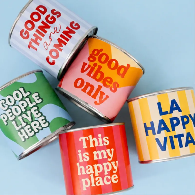 Velas aromáticas en lata de colores con frases positivas, colección Happyideas
