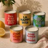 Velas aromáticas en lata Happyideas encendidas