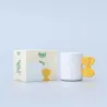 Taza Pasta junto a su caja de embalaje con diseño de hojas verdes - Happyideas